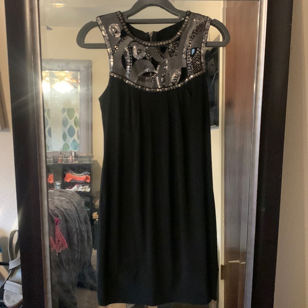 Black dress with metal accents. Size small women’s